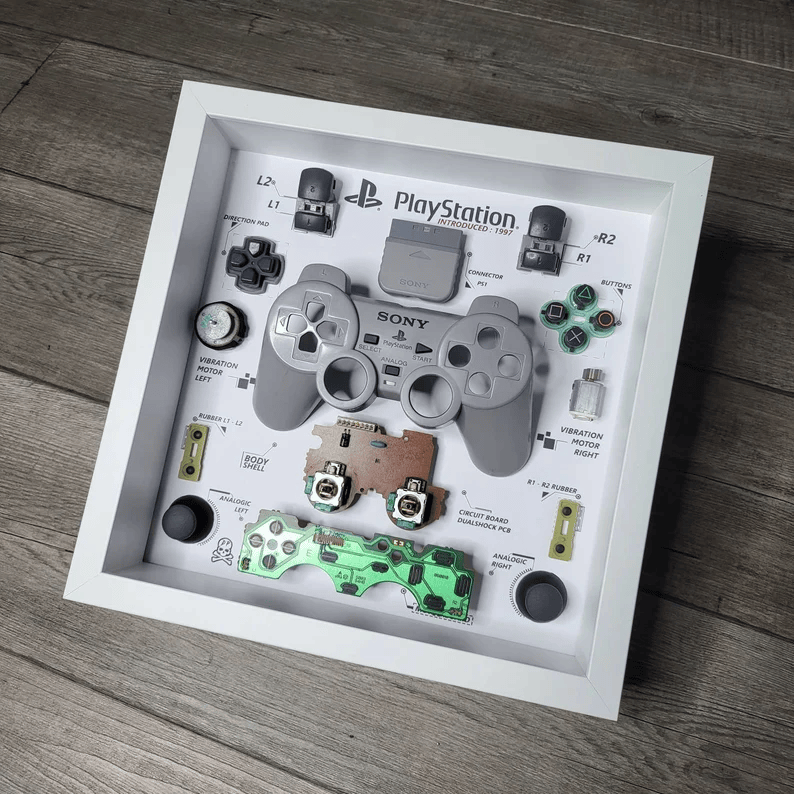 Shadowbox diorama of PS1 dualshock controller